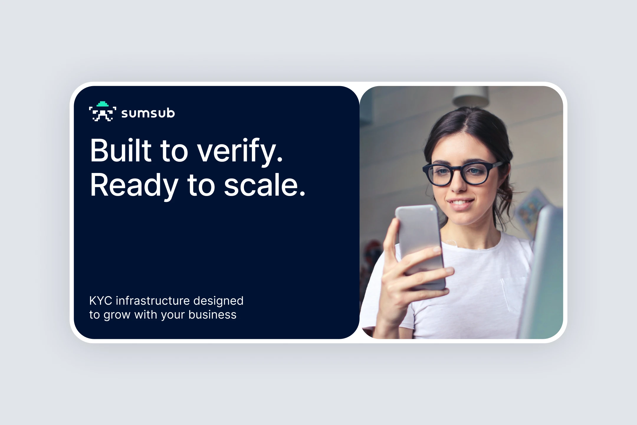 Navy card reading "Built to verify. Ready to scale." beside a smiling woman in glasses holding a phone, on a light gray background